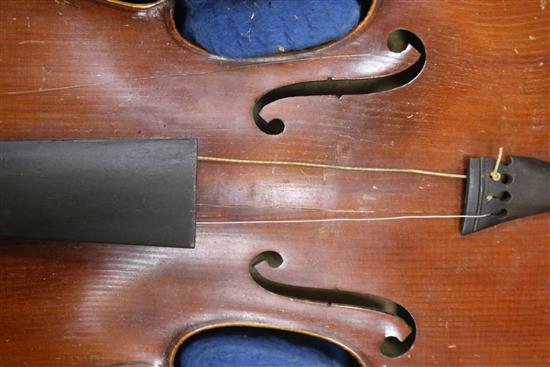 A cased violin, a bow etc